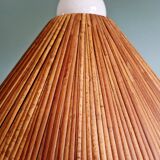 Brass floor lamp with rattan shade, 1950s-60s.