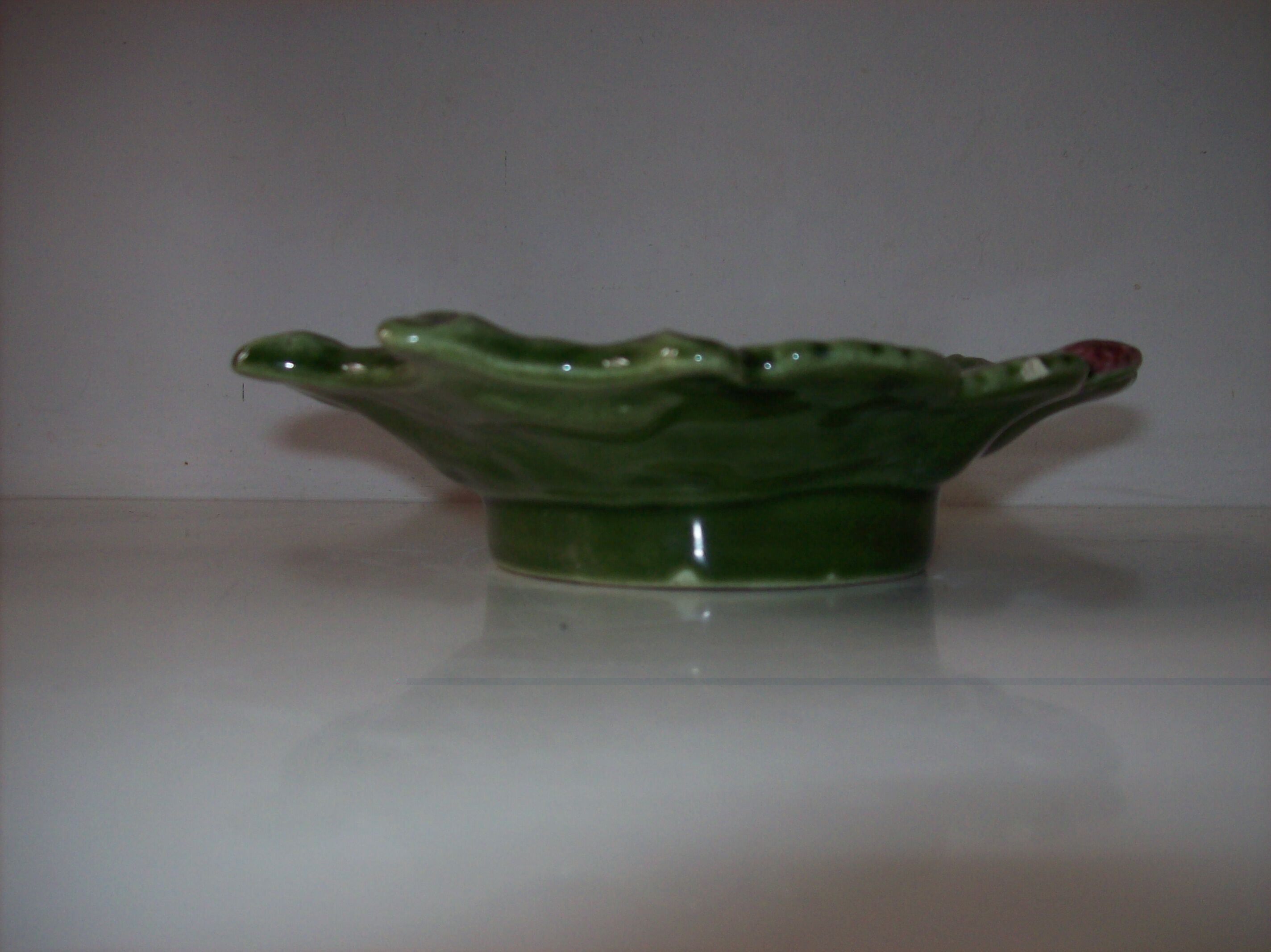 Tidy with raspberry decoration