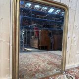 Miroir époque Louis Philippe à la feuille d'or.