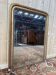 Miroir époque Louis Philippe doré à la feuille d'or