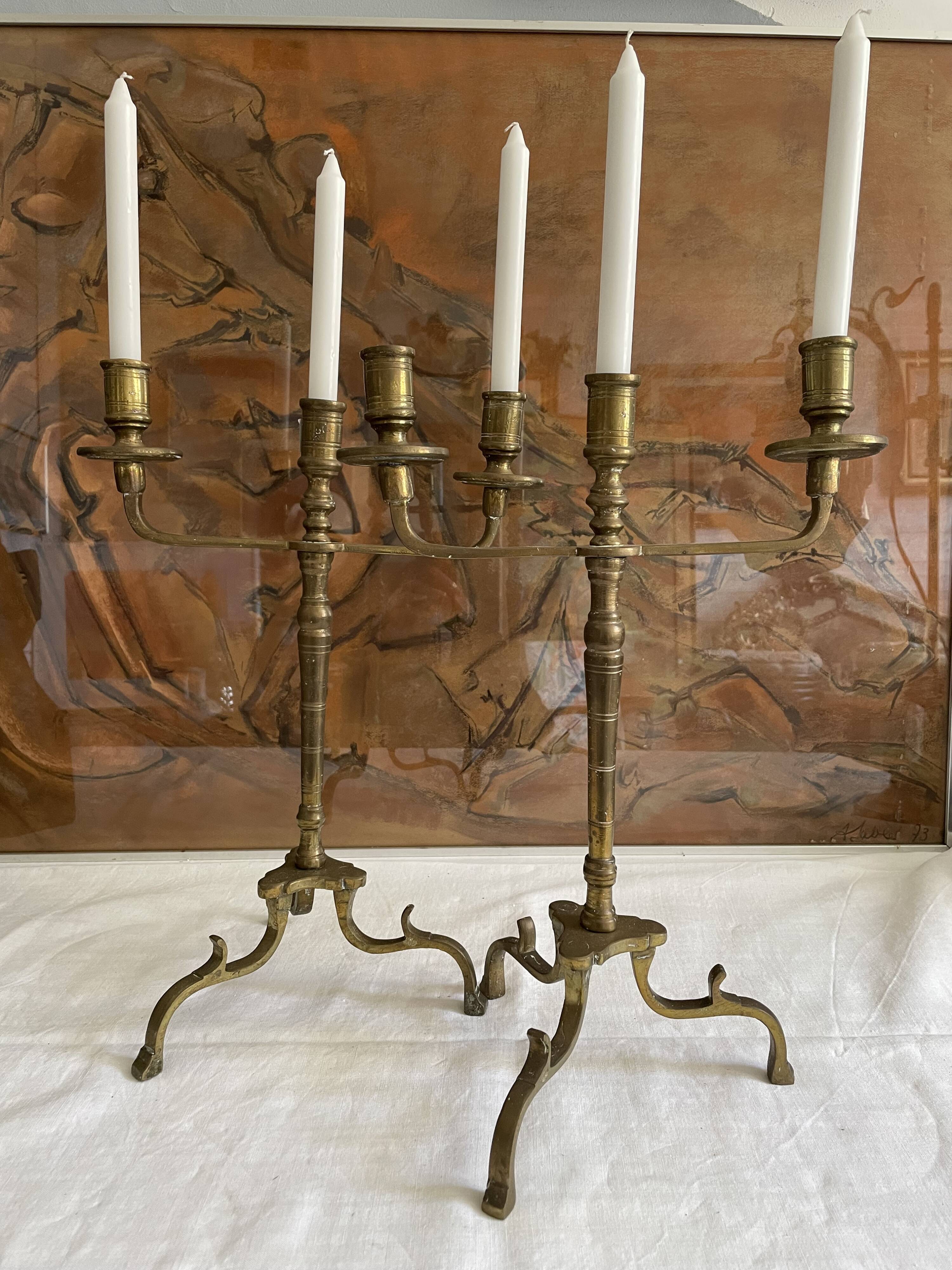 Pair of 3-spoke brass candlesticks