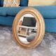 Louis Philippe 19th century oval gilded mirror in wood and stucco