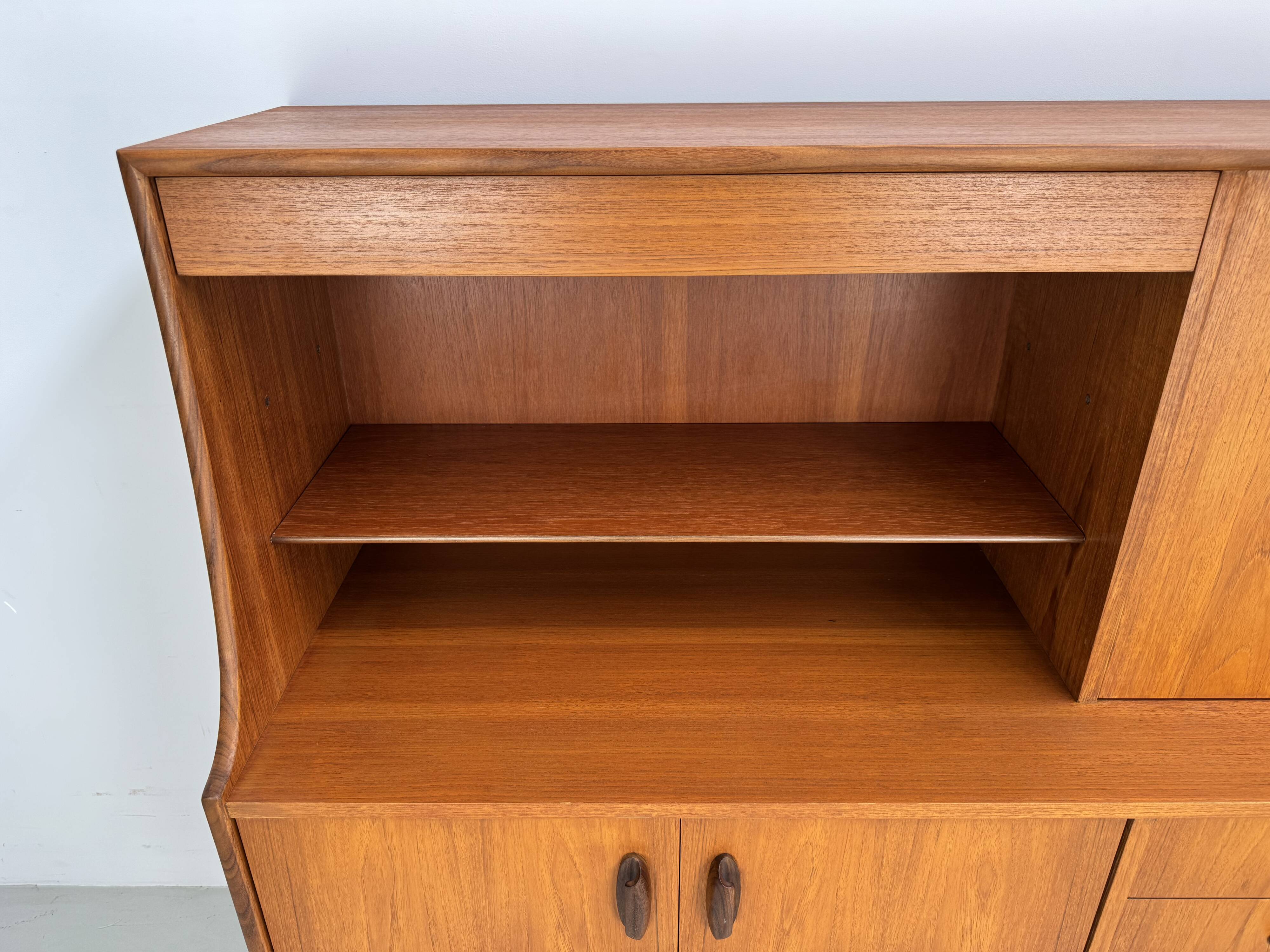 Unique and rare vintage highboard/wall unit from the 1960s made of teak.