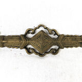 Lot of a pair of chenets and front of gilded bronze fireplace, nineteenth