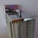 Swarovski wall lamp in silver-plated metal with crystal pendants.