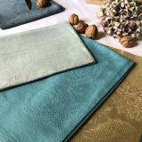 Suite of four tinted antique napkins