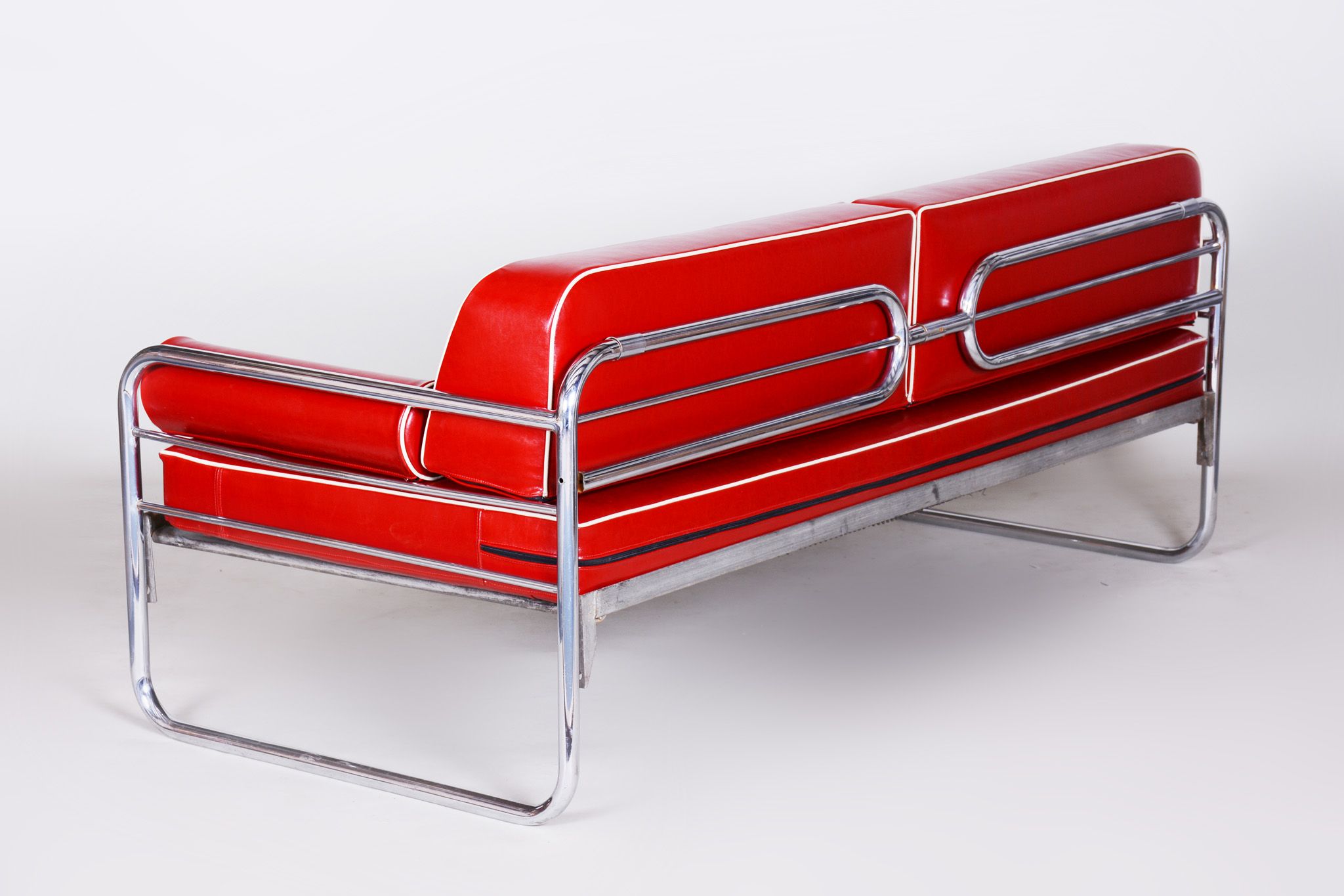 Red leather sofa by Hynekk Gottwald 1930