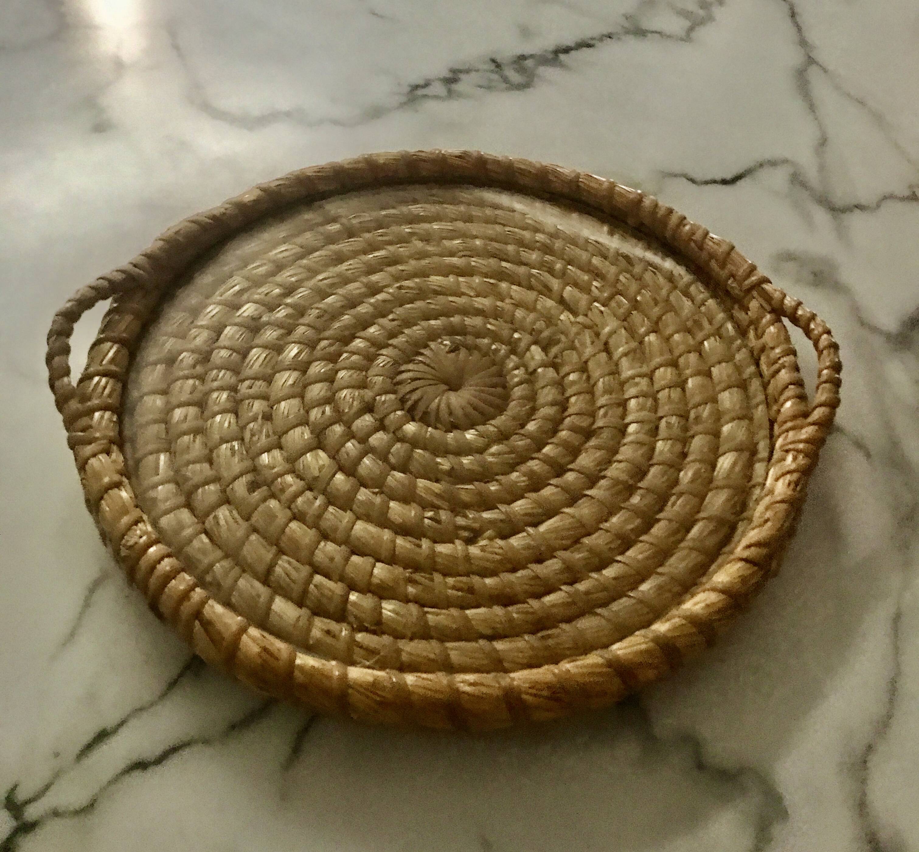 Turned wicker tray and vintage glass