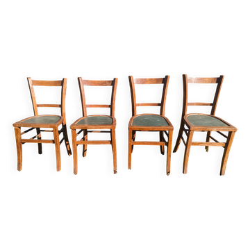 Set of four wooden bistro chairs, green seat, mid-20th century.