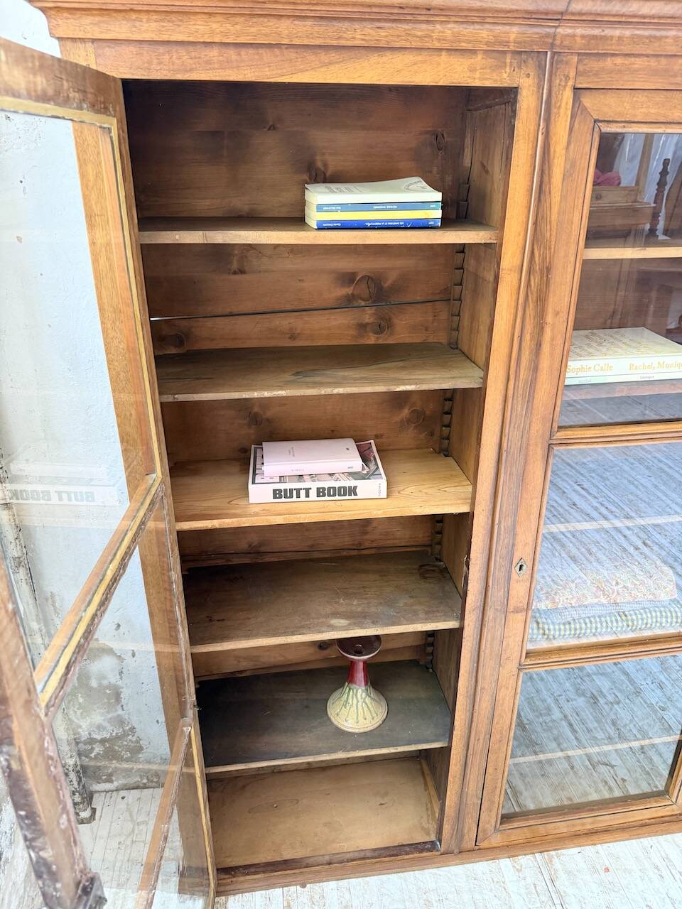 Glass-fronted walnut library 1900