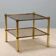 Vintage brass coffee table with glass top, Italian design 1970s.