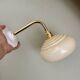 Vintage angled wall lamp with pale yellow opaline shade