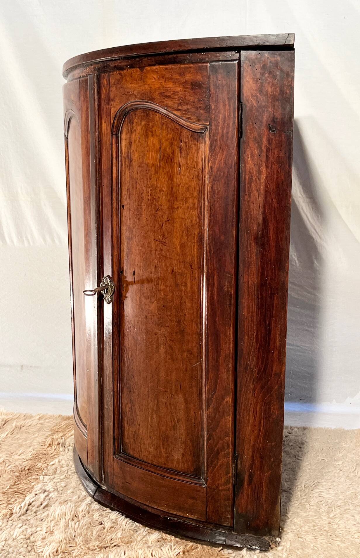 18th century corner, with curved walnut door