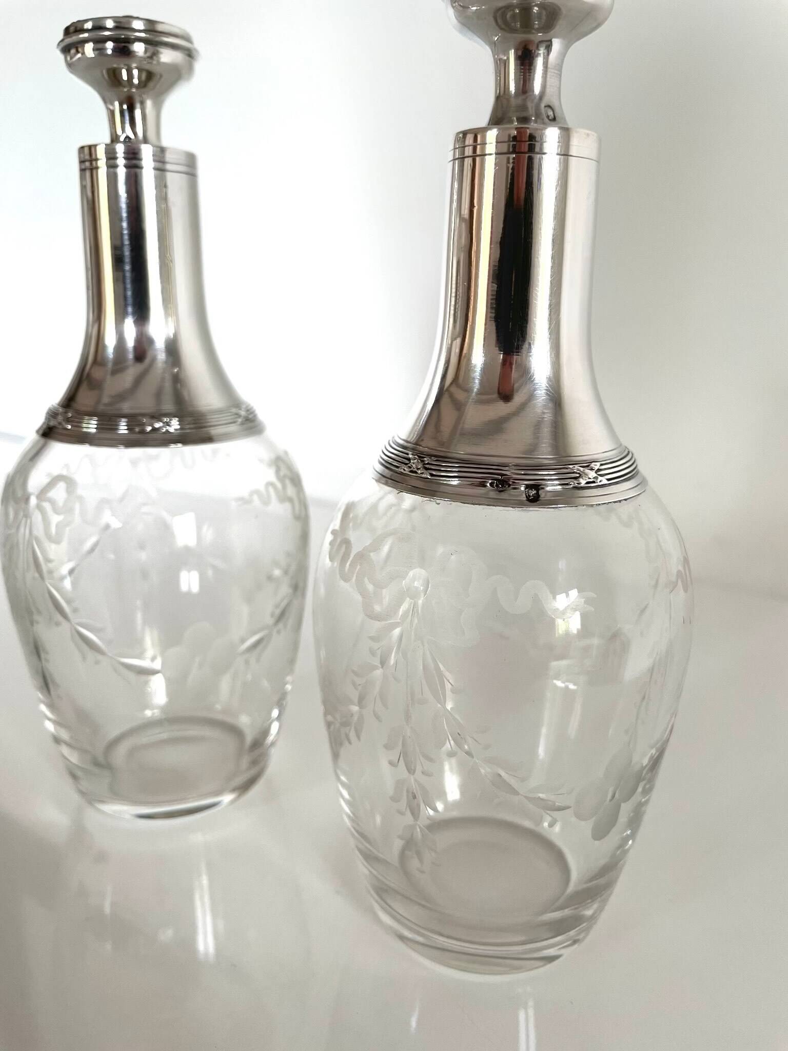 Pair of crystal and silver decanters - early 20th century
