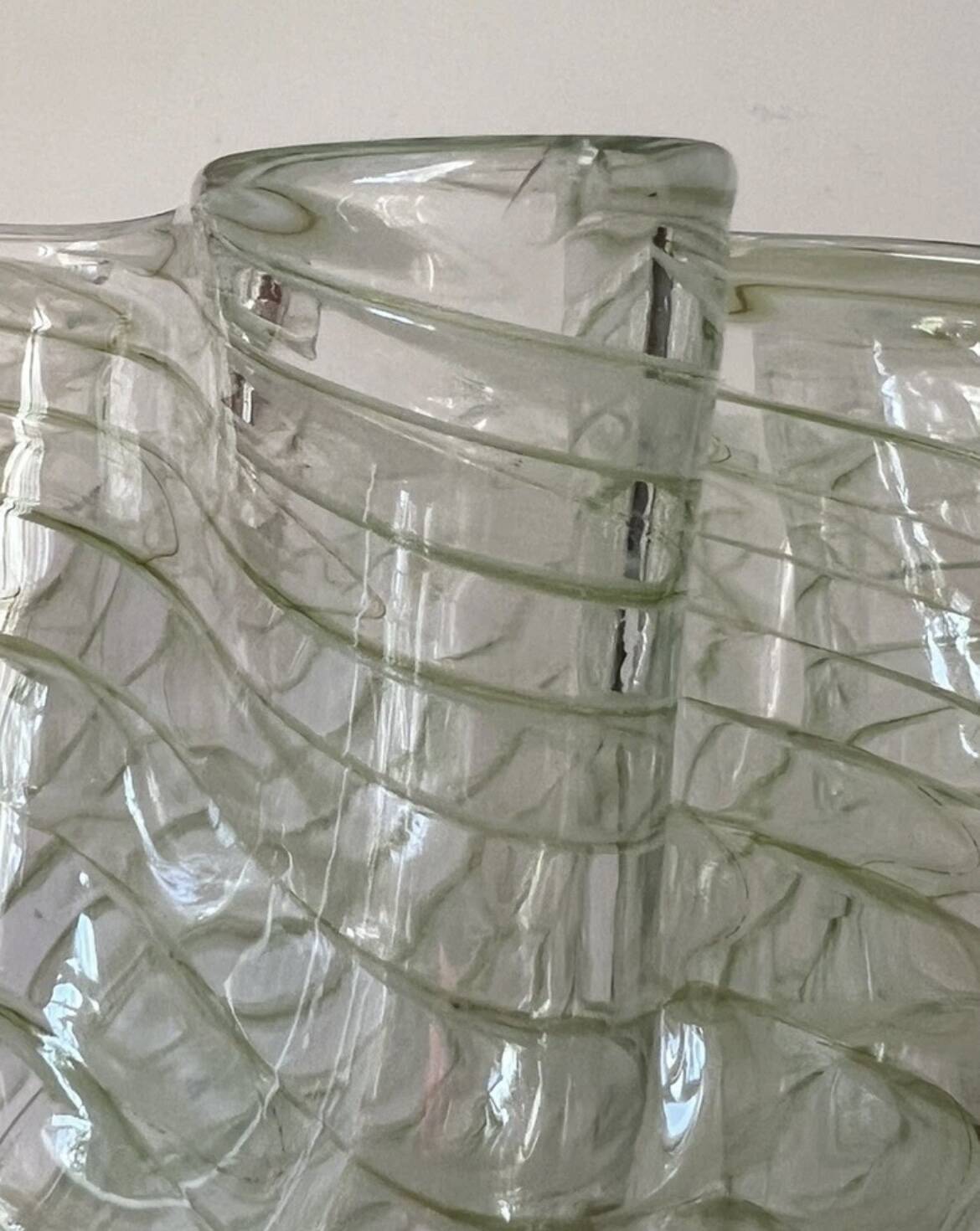 Filigree handkerchief-shaped glass vase with corolla neck