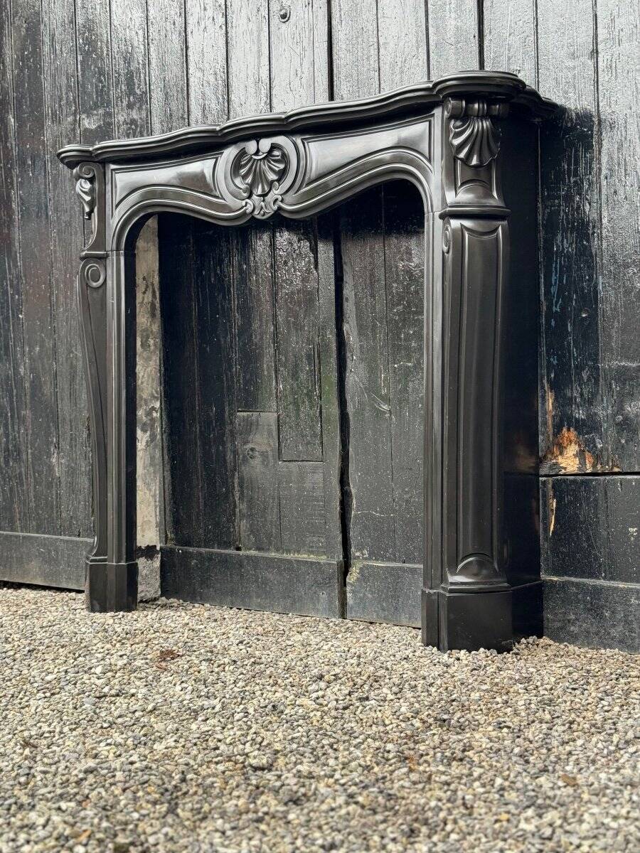 Louis XV style fireplace in black Belgian marble circa 1880