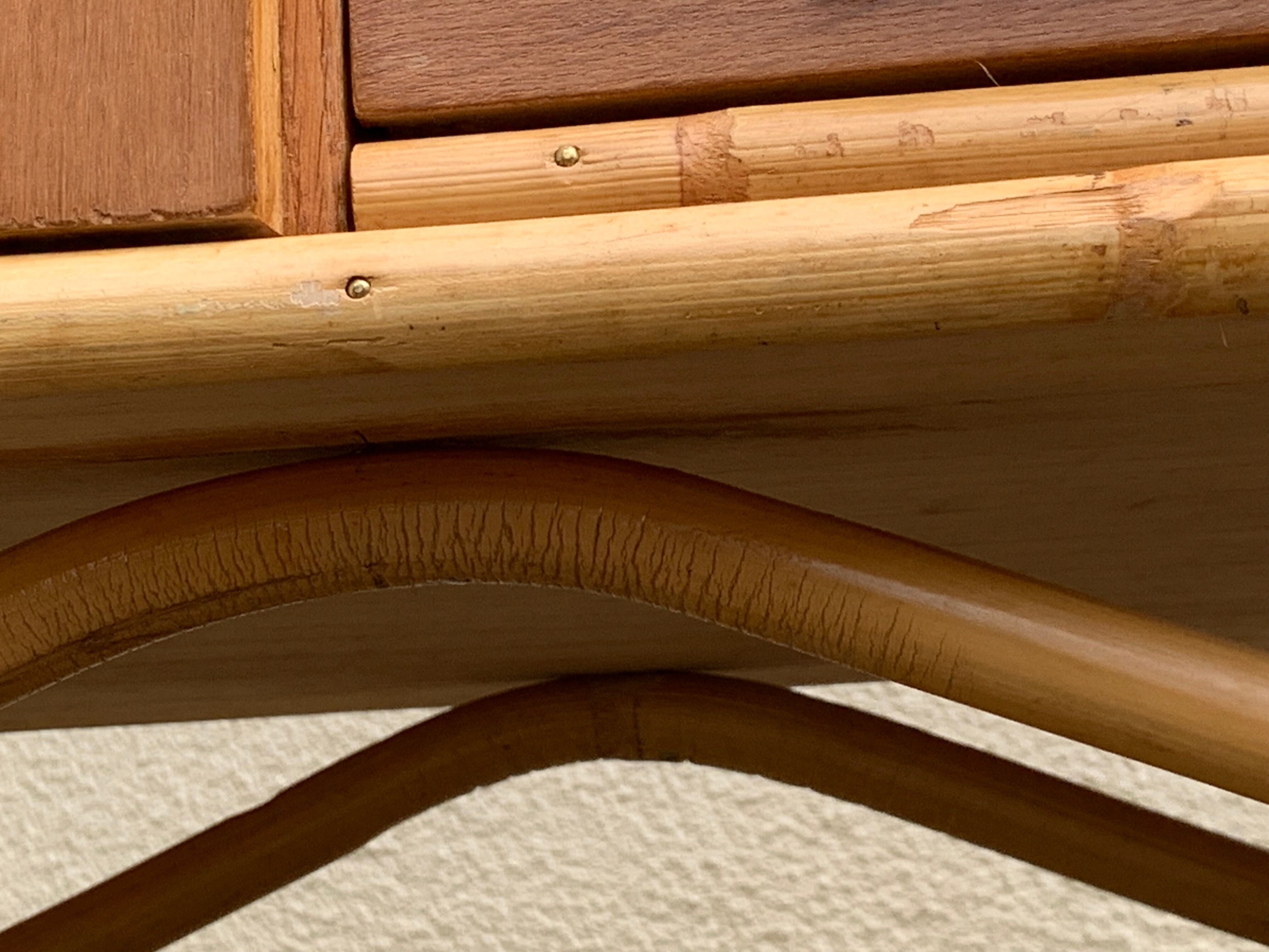 Rattan wardrobe with tapered legs from the 1960s.