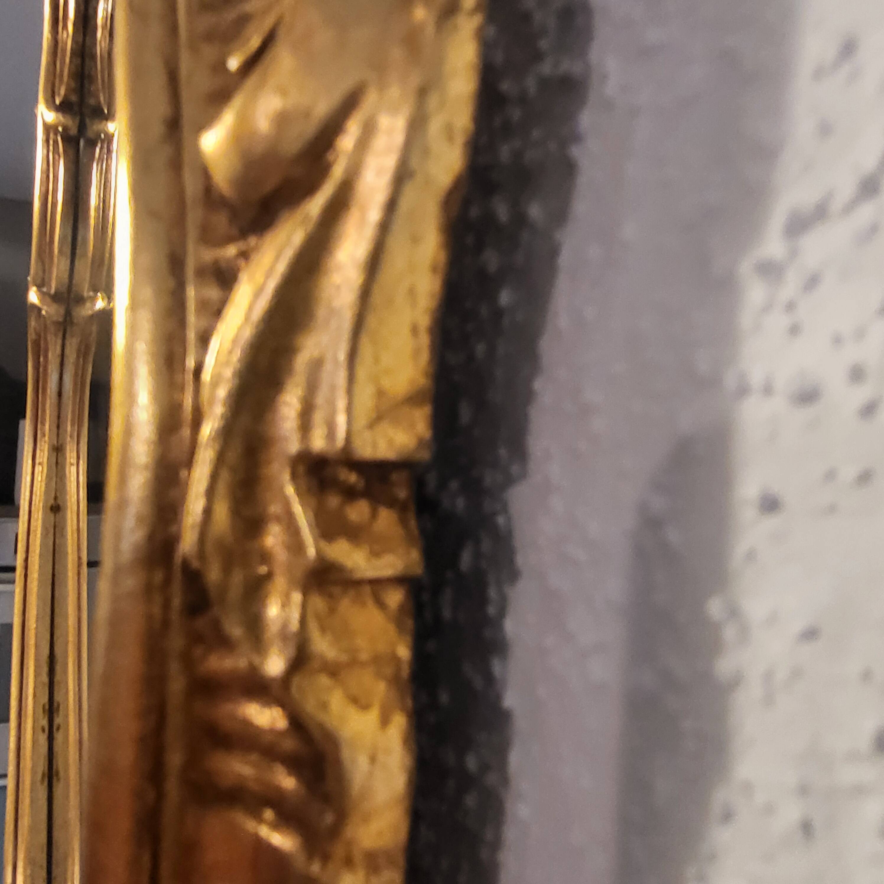 Miroir en bois d'or à  l or,style Louis 15
