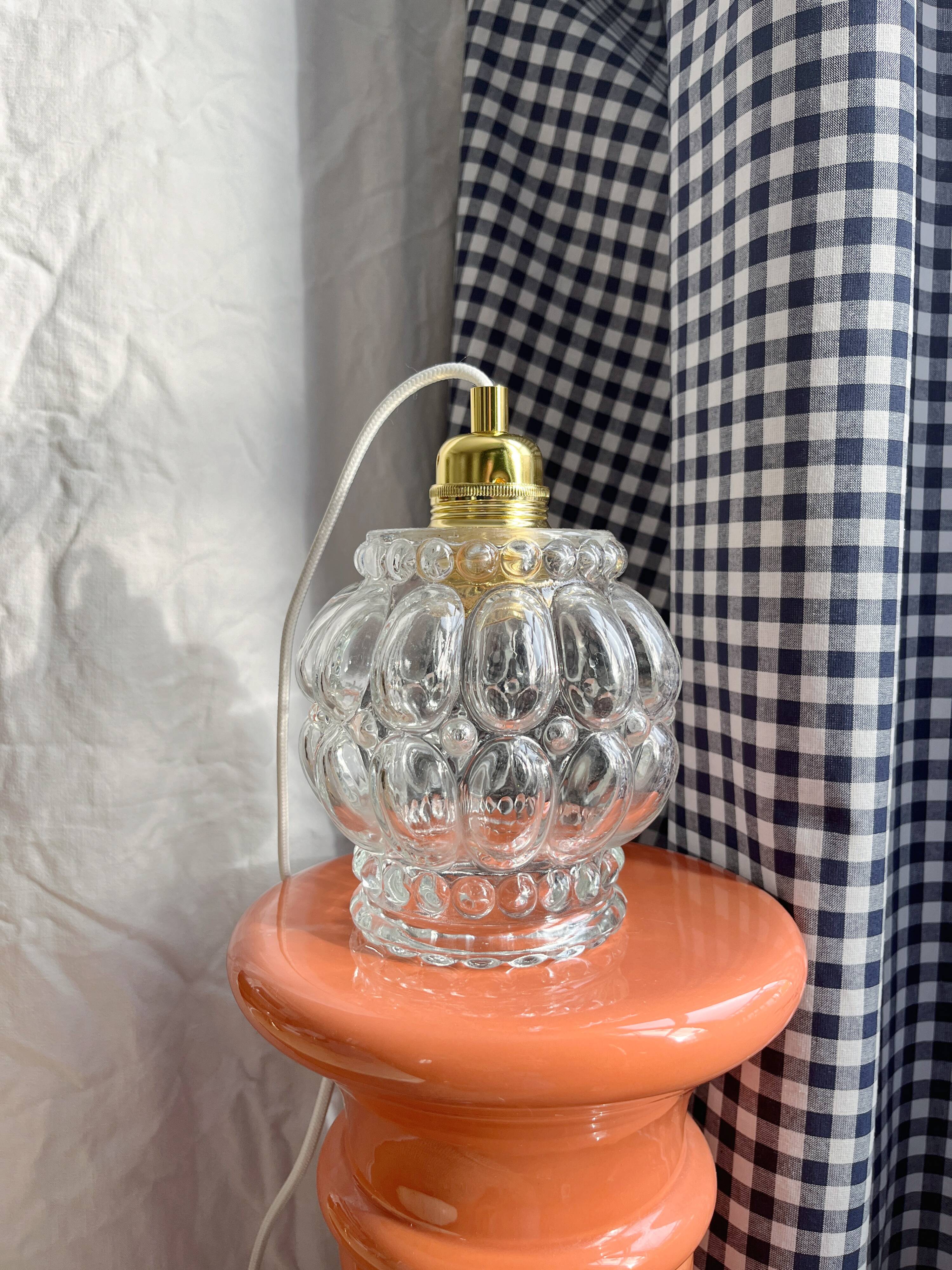 Baladeuse en verre moulé