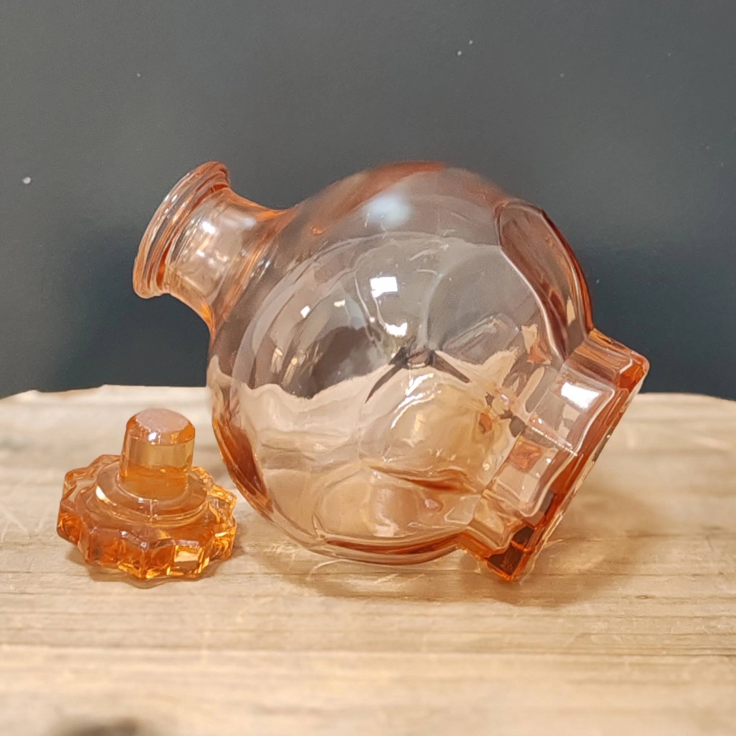 Small pink glass carafe