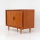 Svend Dyrlund teak sideboard with tambour doors (Denmark, 1960s).