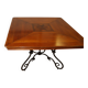 Square cherry wood table with drop leaves.