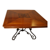 Square cherry wood table with drop leaves.