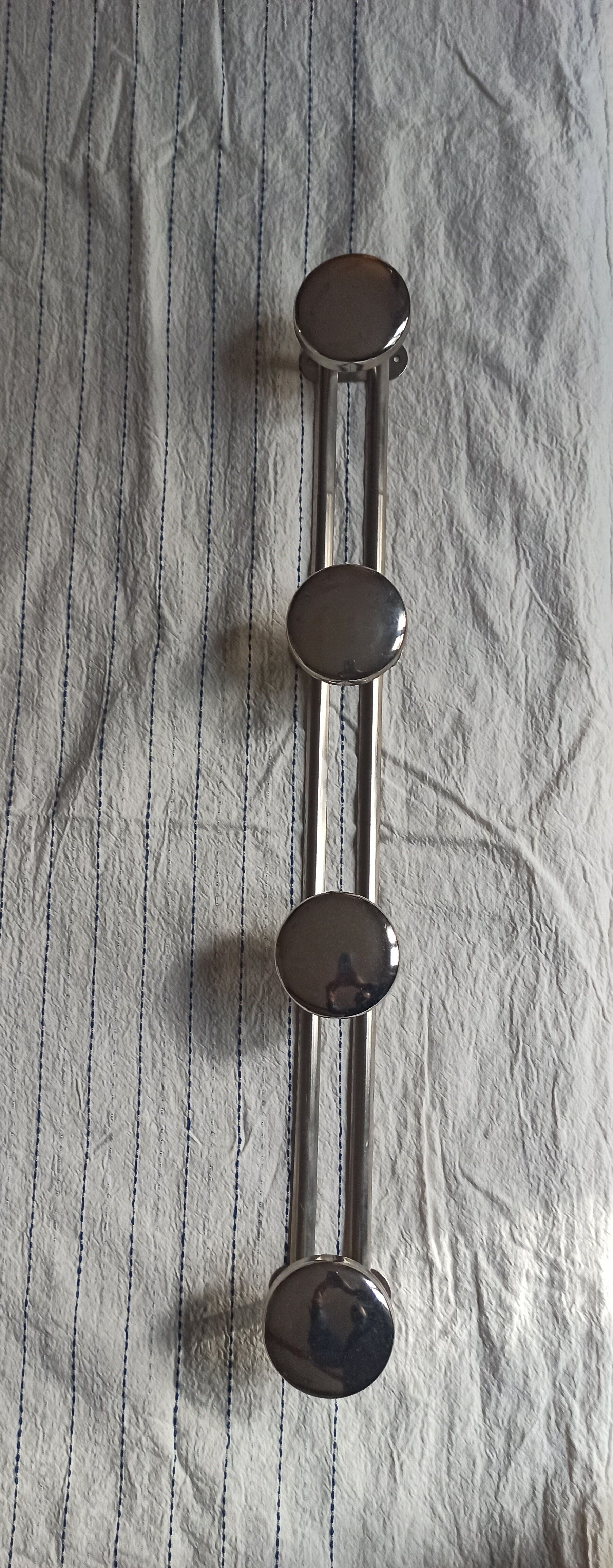 Metal wall coat rack