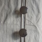 Metal wall coat rack