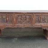 Old wooden console with chains