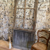 Old glazed wooden door patinated