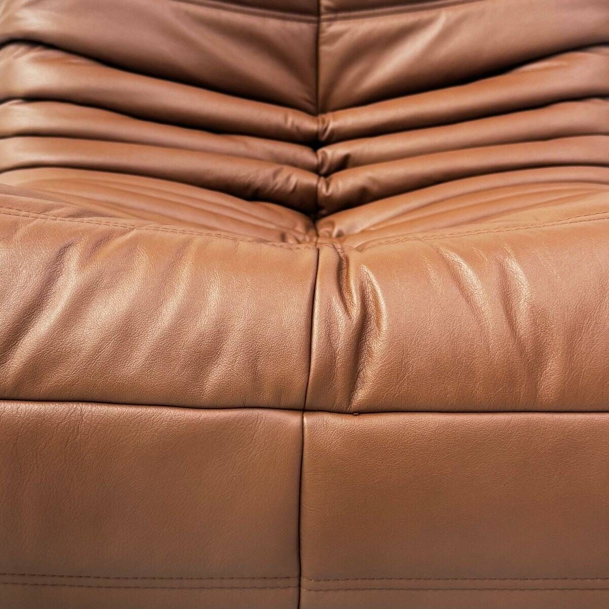 Togo lounge chair in dark cognac leather attributed to Michel Ducaroy for Ligne Roset