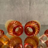 Pair of Baccarat twisted tinted crystal bottles