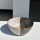 White and glossy brown two-tone ceramic bowl, matt earth