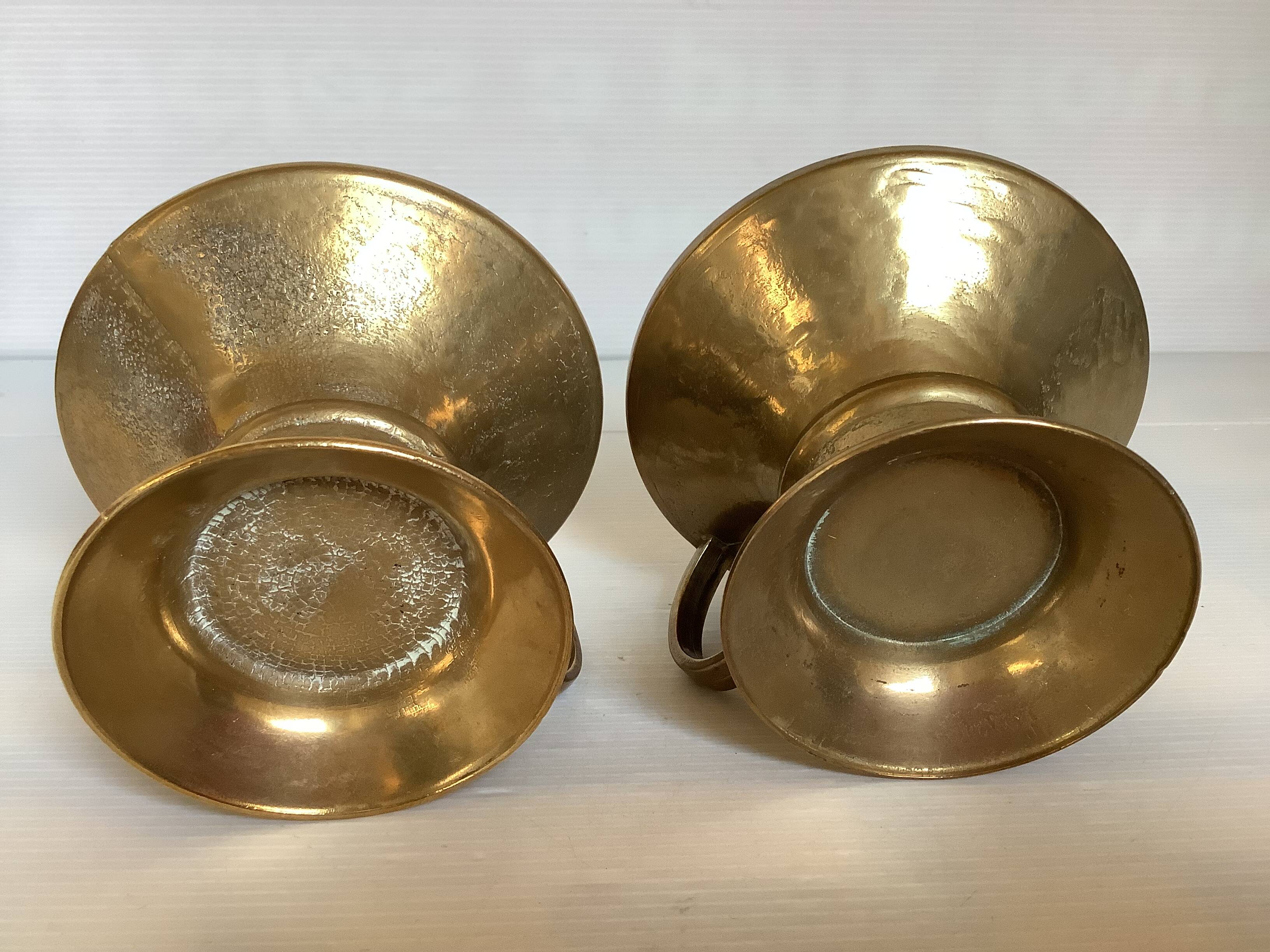 Pair of rat cave candlesticks with tulip base in bronze.