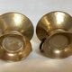 Pair of rat cave candlesticks with tulip base in bronze.