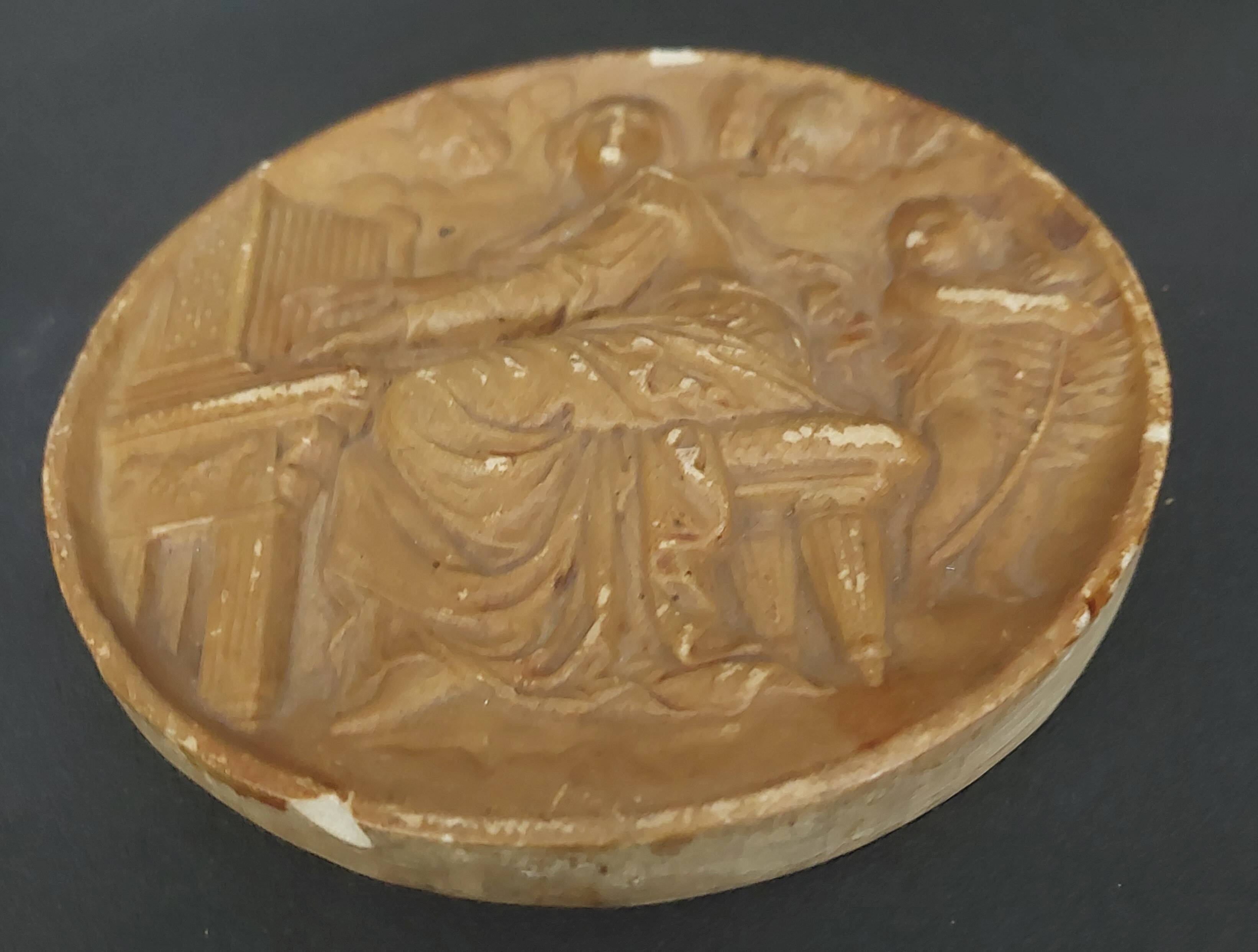 Tondo medallion in patinated plaster, woman and putti, late 19th century