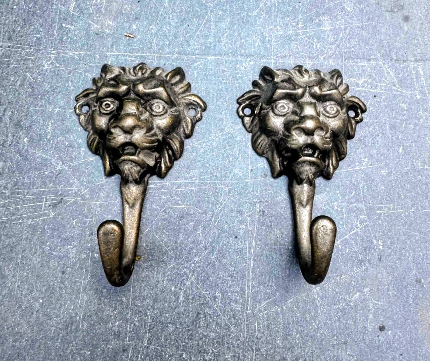 2 brass lion coat hooks 19th century