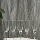Set of 5 glass champagne flutes with twisted ribbed base
