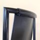 4 postmodern design chairs in black metal and leather, 1980's