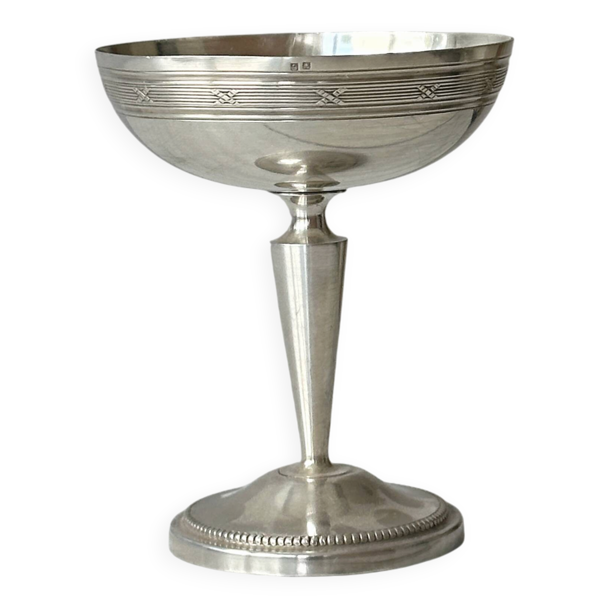 Silver-plated metal stand.