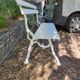 Old garden bench with cast iron feet and wooden planks