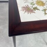 Nested tables in curved wood with ceramic top by Thonet.