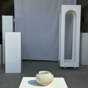 Small white ball vase tight neck in glazed speckled ceramic