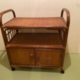 Rattan serving trolley with wheels