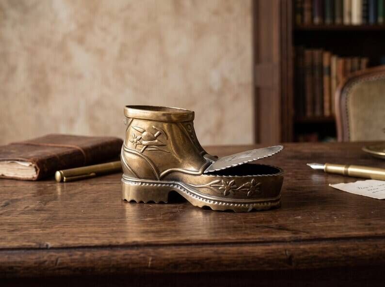 Vintage ashtray in the shape of a hiking boot with a hinged lid