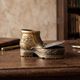 Vintage ashtray in the shape of a hiking boot with a hinged lid