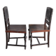 Pair of antique wooden and brown leather dining chairs, brass studs.
