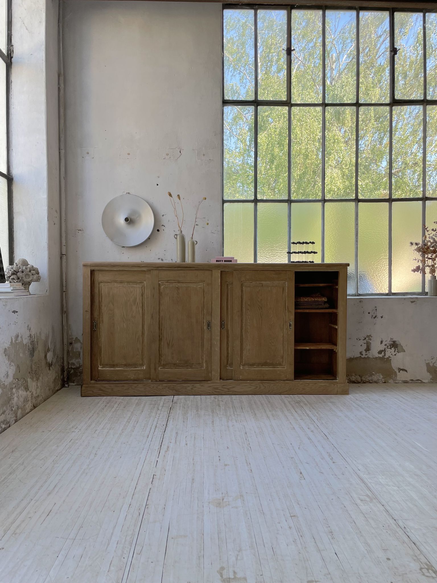 Large row of solid oak loom sliding doors