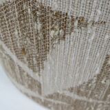Vintage lampshade with palm leaf pattern.